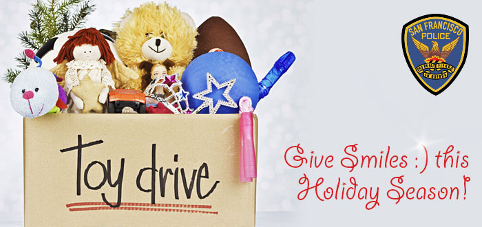 SFPD Toy Drive header with image of box of toys and text “Give Smiles this Holiday Season”