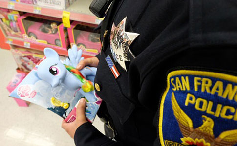 SFPD Officer holding blue pony