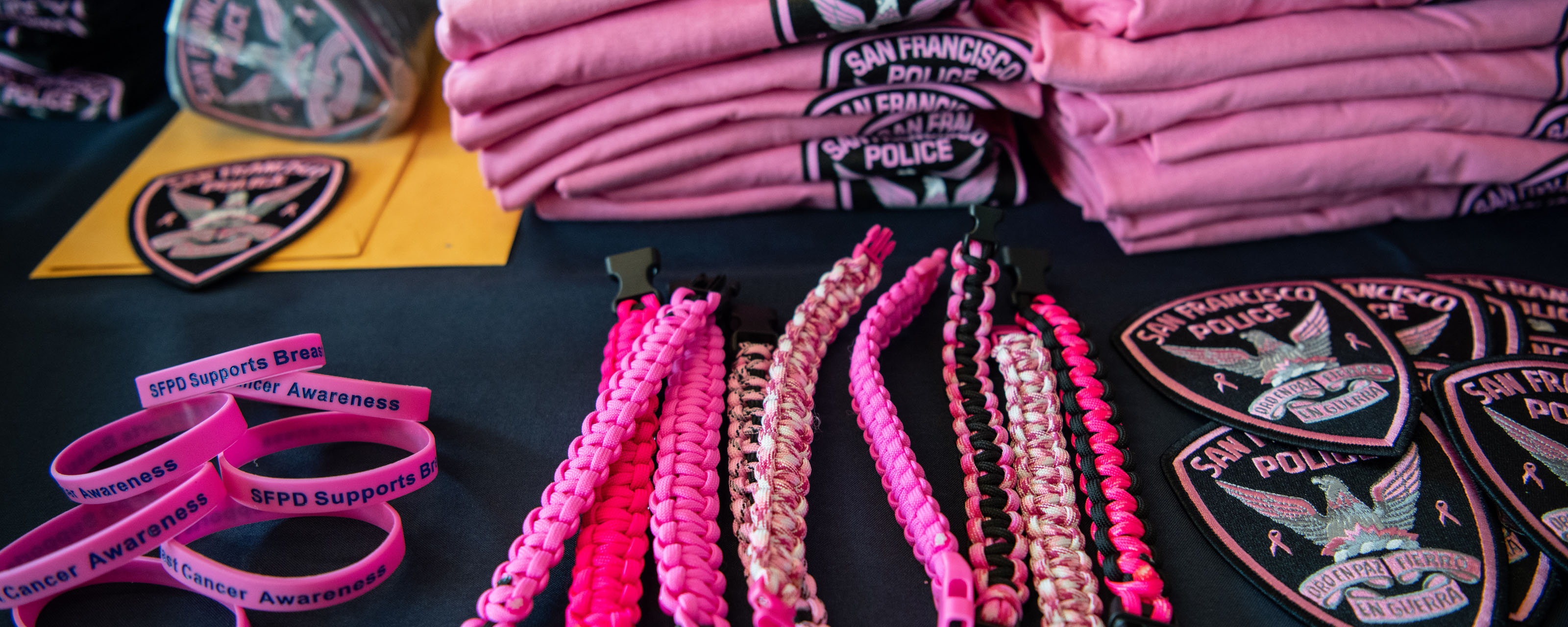 SFPD Pink Patch T-shirts, Pins and Bracelets