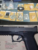 Image of firearm and narcotics seized