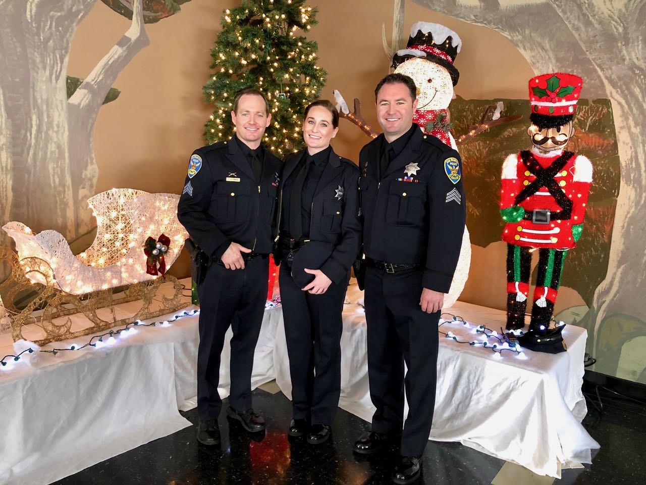 Three siblings in uniform