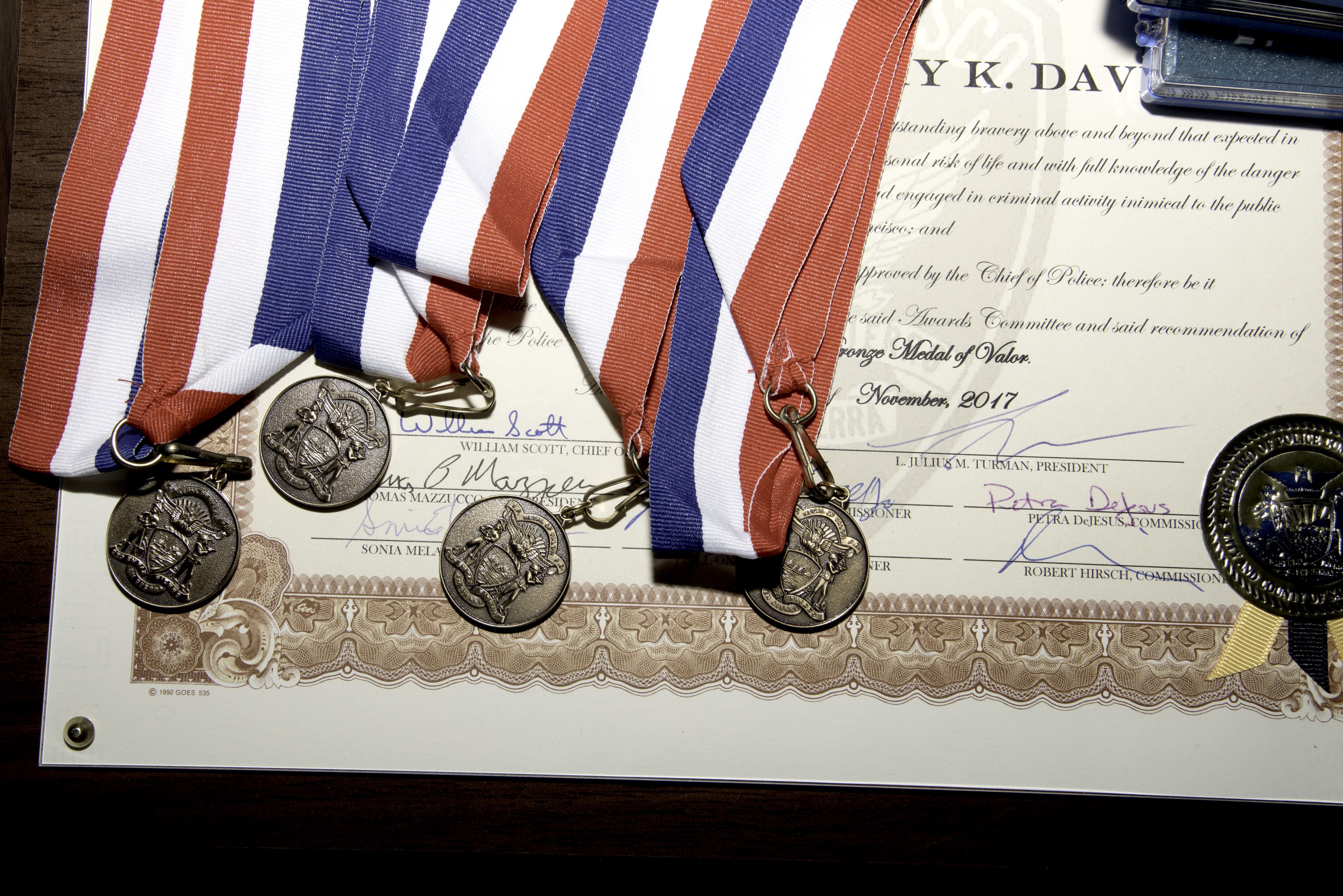 Photo of the certificate and medals