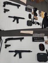 Image of firearms and ammunition seized from robbery suspect