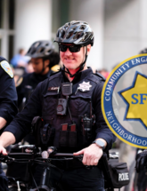 Image of police officers on bicycle patrol wearing sunglasses