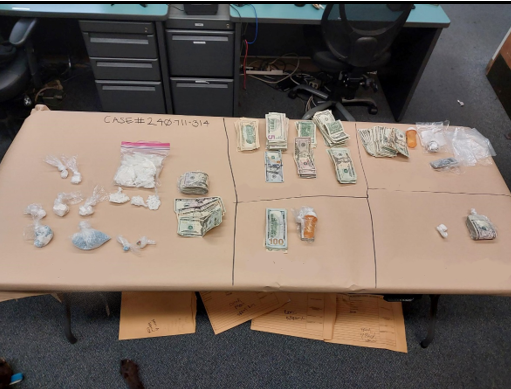 Image of narcotics and US currency seized from suspect