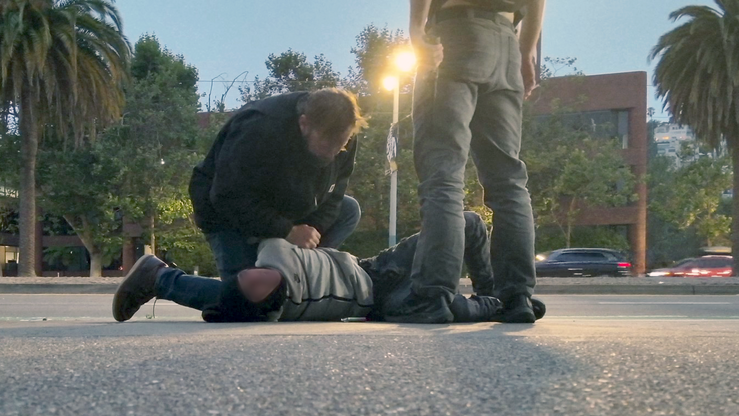 Image of suspect being arrested